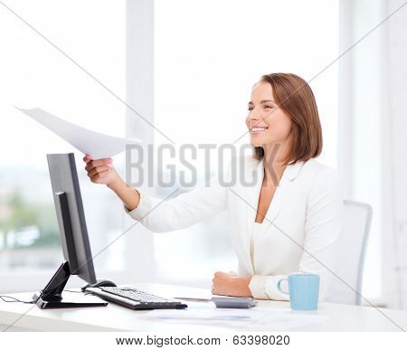 business adn education concept - smiling businesswoman giving papers in office