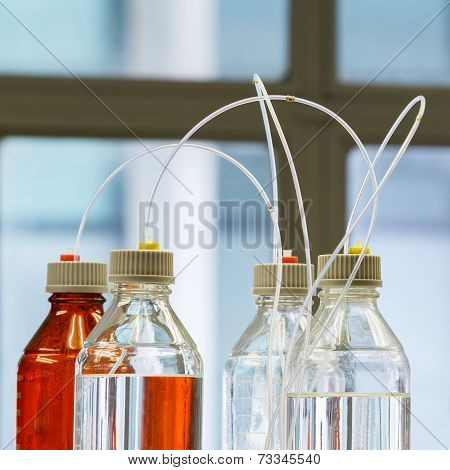 Glass Bottle With Plastic Hose