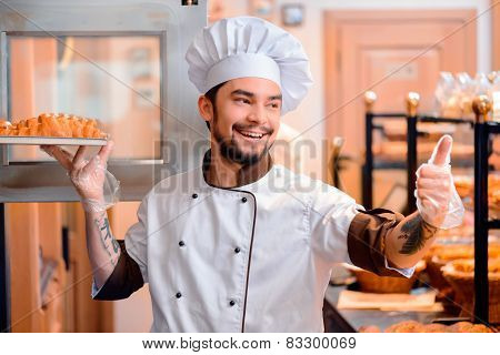 Handsome cook in the kitchen