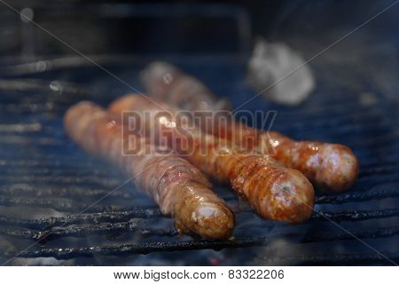 Sausage grilling on a barbecue