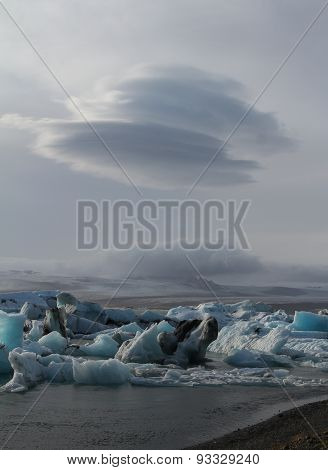 Tranquil Blue Icebergs In Jokulsarlon Lake