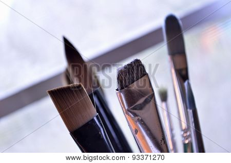 Closeup Of Paintbrushes In An Art Studio