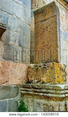 The traditional Armenian patterns on the medieval Khachkar in Haghartsin Monastery Armenia.