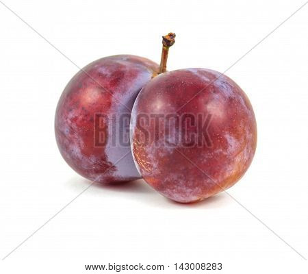 Plum twins isolated on white background fruit.