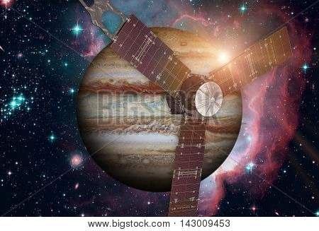 Juno spacecraft and Jupiter. Elements of this image furnished by NASA.
