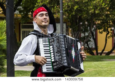 SELARGIUS, ITALY - September 13, 2015: Former marriage Selargino - Sardinia - accordionist of the folk group 