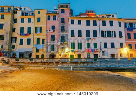 The old main square on the waterfront in the Italian village of Vernazza at night. Parco Nazionale delle Cinque Terre, Liguria, Italy.