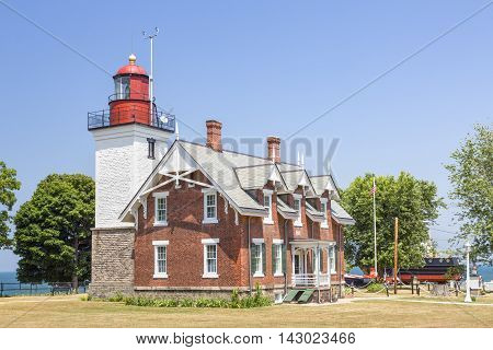 The Dunkirk Lighthouse also known as the Point Gratiot Light shines its beacon over the New York coast of Lake Erie.