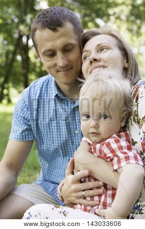 happy family outdoor Symbolize caring and happiness