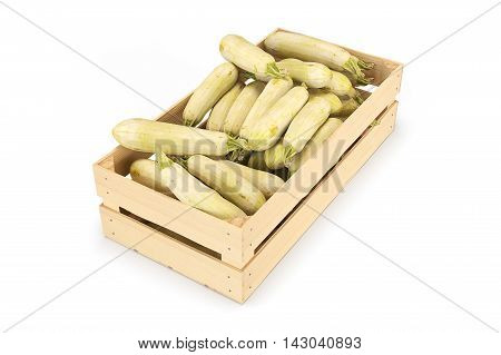 Squash in a wooden box. Isolated on white. 3D rendering