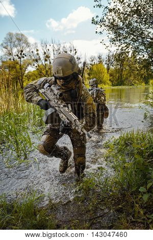 Green Berets US Army Special Forces Group soldiers in action