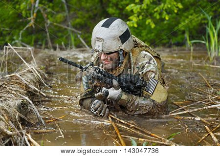 Green Berets US Army Special Forces Group soldier in action