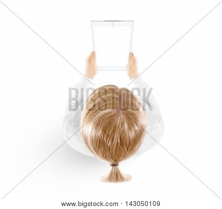 Woman hold tablet pc mockup in hand top view isolated on white. White mobile ebook mock up holding in female hands from above. Blank tablet screen monitor. Clear vertical display pad booklet person