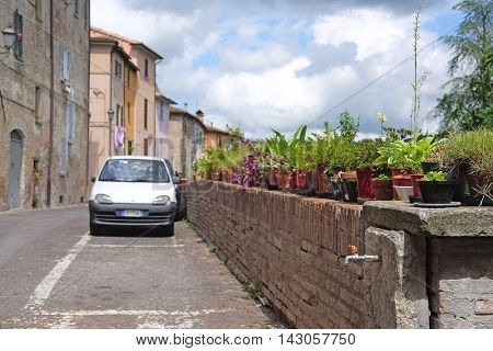 Urbania, Italy - August, 1, 2016: car parking in Urbania, Italy 