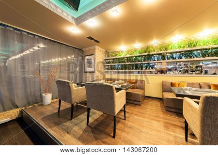 MOSCOW - JULY 2014: Interior of stylish Mediterranean cuisine Italian restaurant - 