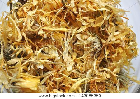 A close-up of dried marigold (Calendula officinalis) petals