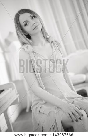 Black and white portrait of pretty young woman