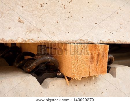 Wooden Beam As Separator For Safety Manipulation By Forklift.  Concrete Railway Ties