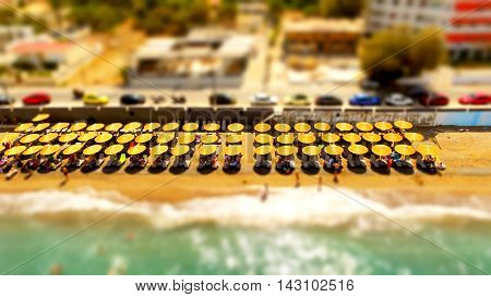umbrellas on beach tilt shift greece alepochori
