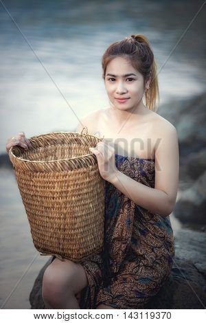 Sexy Asian woman bathing in a stream Thailand.
