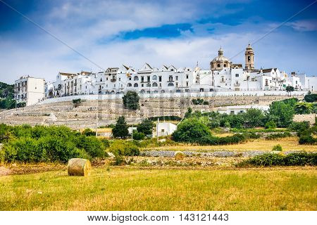 Locorotondo Italy. Panoramic view of whitwashed city in Italian region of Puglia (Apulia). Town known for its wines and for its circular structure which is now a historical center.