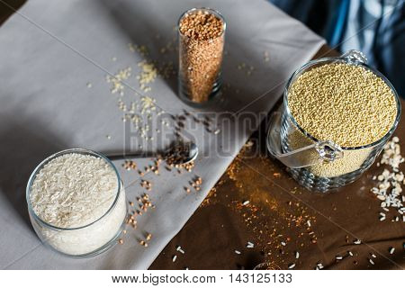 cereal grain glass saddle organic vegetarian oat healthy background diet table breakfast natural wooden healtn spices in a spoon