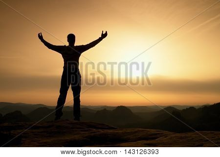Happy Man With Open Raised Arms Gesture Of Triumph. Satisfy Hiker  Silhouette
