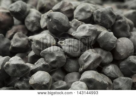  Dried black Ceci Neri chickpeas full frame close up