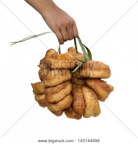 Hand holding traditional fresh baked Moroccan donuts