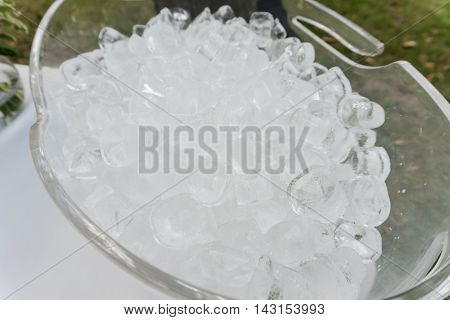 The texture of the ice cubes, frozen cubes of ice. Cocktail ice