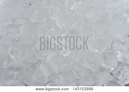 The texture of the ice cubes, frozen cubes of ice. Cocktail ice