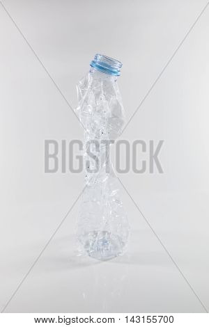 plastic bottles that can be recycled. Bottles of water being squeezed