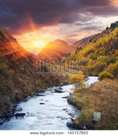 Mountain River. Evening landscape. Autumn. Community Ushguli. Inguri River. Caucasus, Georgia, Zemo Svaneti. Collage of two frames. Art processing photos