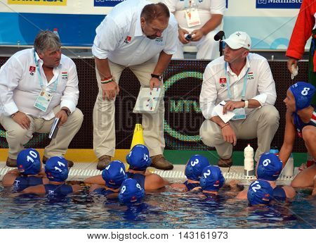 Budapest, Hungary - Jul 16, 2014. Hungary's Andras MERESZ head coach talking about the tactics. The Waterpolo European Championship was held in Alfred Hajos Swimming Centre in 2014.