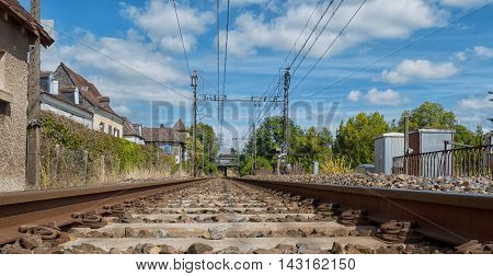 Railway track with Orthez village in France