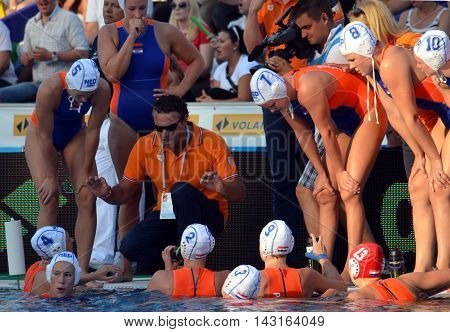 Budapest, Hungary - Jul 16, 2014. Netherland's HAVENGA Arno head coach talking about the tactics. The Waterpolo European Championship was held in Alfred Hajos Swimming Centre in 2014.