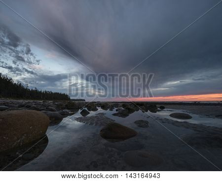 The sun sets along the nootka island coast
