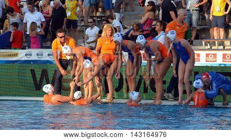 Budapest, Hungary - Jul 16, 2014. Netherland's HAVENGA Arno head coach talking about the tactics. The Waterpolo European Championship was held in Alfred Hajos Swimming Centre in 2014.