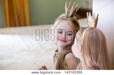 The Little Princess Looks In The Mirror