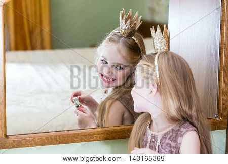 The Little Princess Looks In The Mirror
