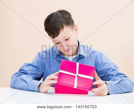 The Boy Opens A Box Of Surprise