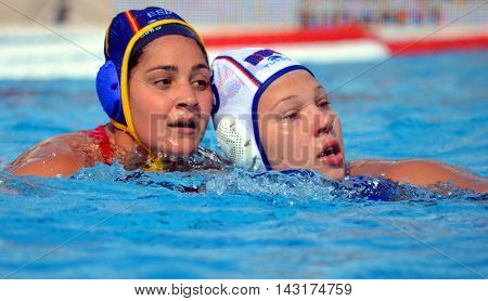 Budapest, Hungary - Jul 16, 2014. KRIMER Kseniia (RUS, 5) fighting against MIRANDA DORADO Lorena (ESP, 7). The Waterpolo European Championship was held in Alfred Hajos Swimming Centre in 2014.
