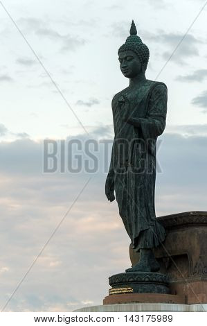 Buddha Image In Walking Posture