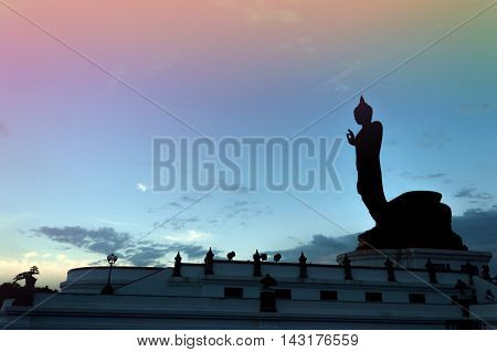 Silhouette Buddha Image In Walking Posture In Silhouette
