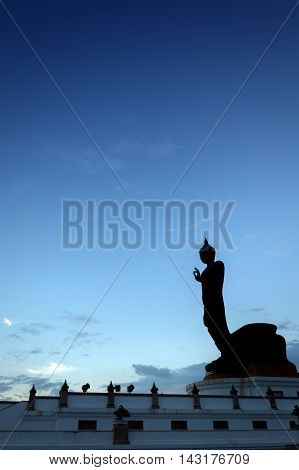 Silhouette Buddha Image In Walking Posture