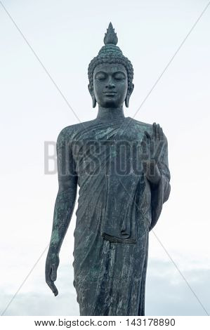 Buddha image in walking posture at Buddhamonthon (Phutthamonthon), Buddhist Park in Nakhon Pathom, Thailand