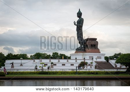 Walking Buddha Statue At Buddhamonthon (phutthamonthon), Buddhist Park In Nakhon Pathom, Thailand