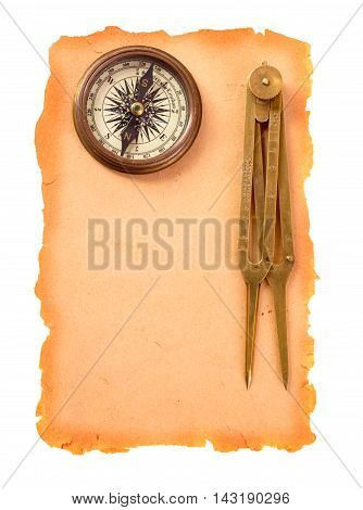 Compass and marine navigation divider on old paper