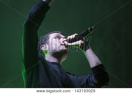 Bontida, Romania - July 17, 2016: Singer Dan Smith of english band Bastille singing during a live performance at Electric Castle festival