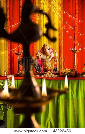 A clay statue of an Indian god Lord Ganesha in ganesh festival